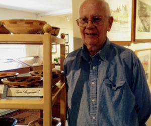 Tom Raymond with his wooden bowls.