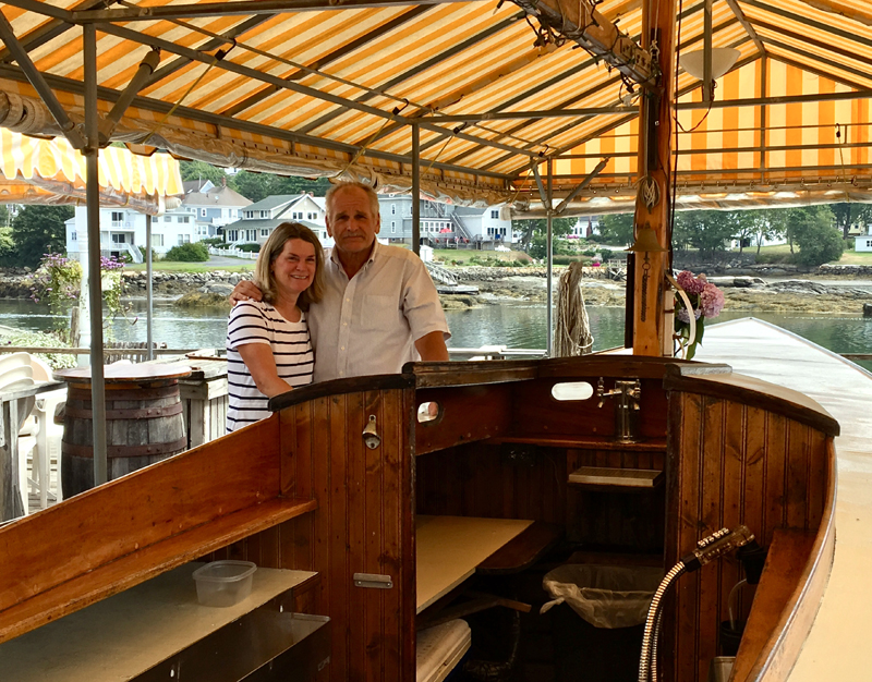 Chowder House owners Sally and Bob Maroon at the restaurant's outdoor Boat Bar. (Suzi Thayer photo)