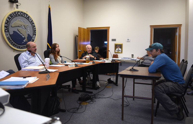 The Damariscotta Board of Selectmen listens to Tom Young-Bayer, of Newcastle, during a public hearing on a single-use plastics ordinance Wednesday, Sept. 19. (Jessica Picard photo)