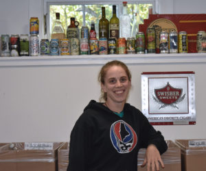 Caitlyn Butler is the manager of Corner Redemption Center in Waldoboro, open 9 to 5 p.m. every day except Thursday and Sunday. (Alexander Violo photo)