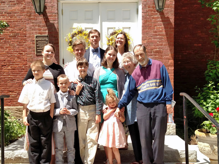 Charlie and Carolyn Blouin (first and second from left) pose for a photo with the Eddyblouin family at St. Patrick's Church in Newcastle.