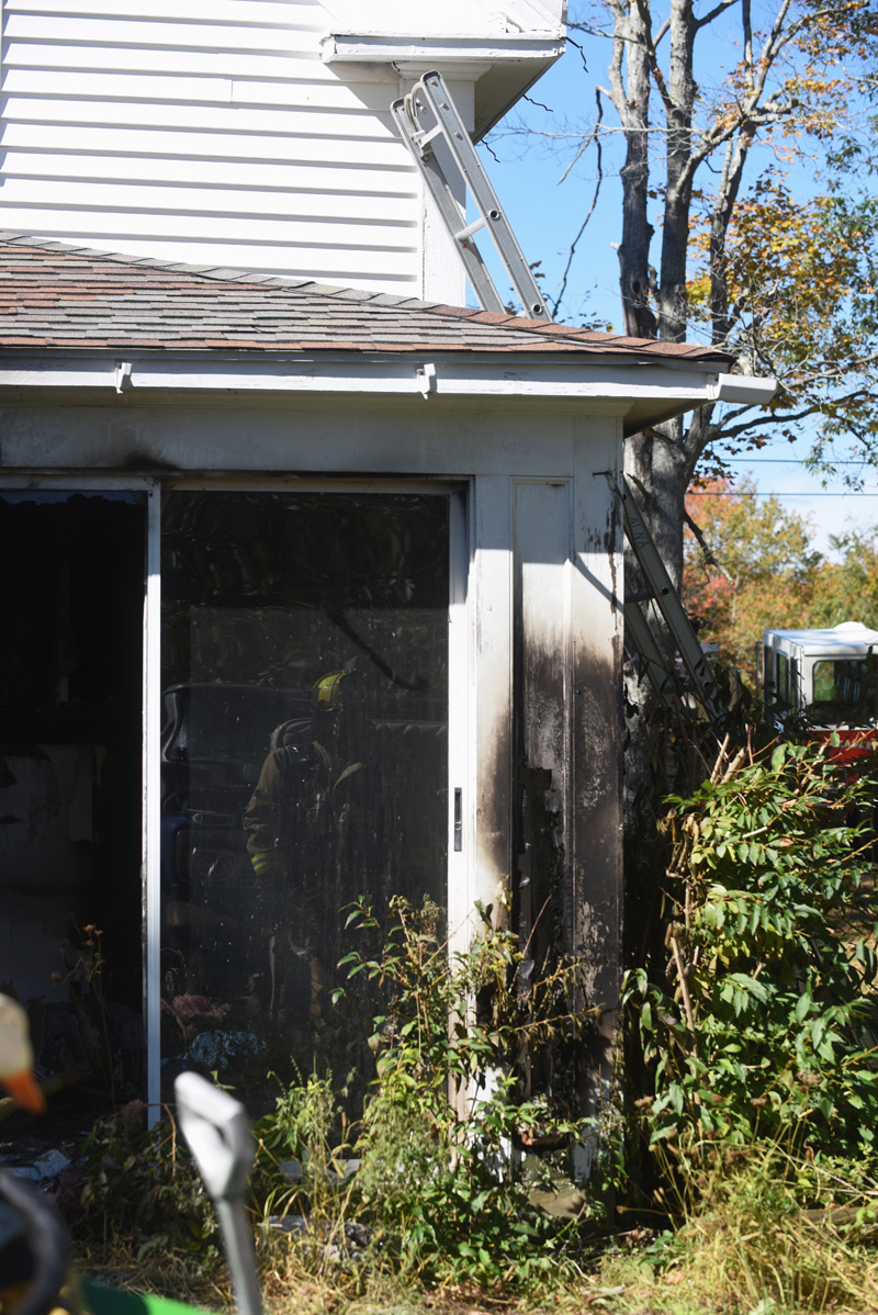 The corner of the back porch, where the fire started, at 1181 West Alna Road in Alna. (Jessica Picard photo)