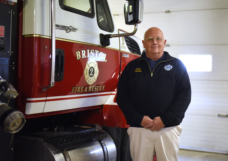 Bristol Fire Chief Paul Leeman Jr. stands next to a fire truck in the Round Pond station Oct. 24. Leeman will report for duty as the town's first full-time fire chief Monday, Nov. 5. (Jessica Picard photo)