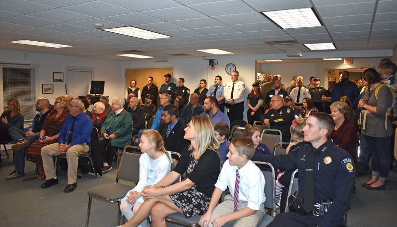 A full house attends the swearing-in ceremony for Waldoboro Police Chief John Lash (front right) at the municipal building Tuesday, Oct. 30. (Alexander Violo photo)