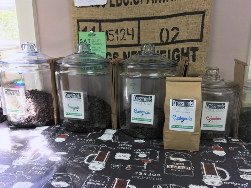 A display of roasted coffee beans from all over the world at Crossroads Coffee Beans in Westport Island. (Suzi Thayer photo)