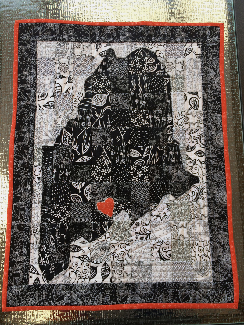 This map-of-Maine quilt is called Â“Home is Where My Heart IsÂ” and was made by Beth Ditkoff.