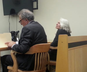 Portland attorney Richard Berne sits next to Nancie Atwell during a sentence hearing at the Lincoln County Courthouse in Wiscasset on Monday, Nov. 26. Atwell, a prominent local author and educator, will avoid jail time for a series of shoplifting incidents. (Jessica Clifford photo)