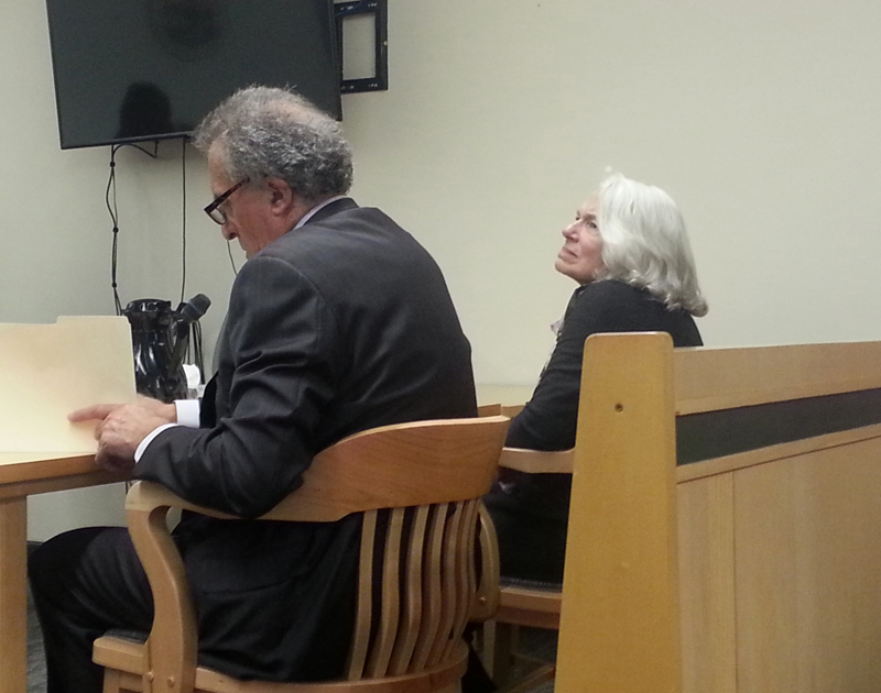 Portland attorney Richard Berne sits next to Nancie Atwell during a sentence hearing at the Lincoln County Courthouse in Wiscasset on Monday, Nov. 26. Atwell, a prominent local author and educator, will avoid jail time for a series of shoplifting incidents. (Jessica Clifford photo)