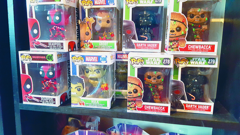 Top sellers at Smitten Collectibles & Nerdy Treasures include Christmas-themed Funko Pop figures. (Amber Clark photo)