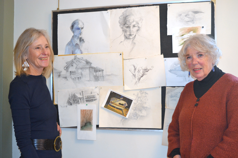 From left: Kathy Leeman, vice president of Legacy Properties Sotheby's International Realty, chats with artist Marlene Loznicka about her early drawings at the opening reception for Loznicka's retrospective show Saturday, Nov. 24. (Christine LaPado-Breglia photo)