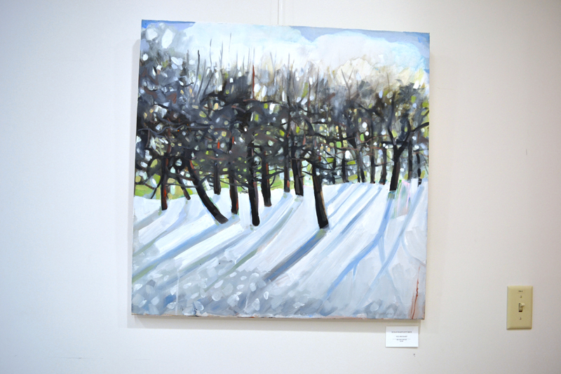 Susan Bartlett Rice's "Ice Orchard" hangs near the fireplace in the lobby of the Central Lincoln County YMCA. (Christine LaPado-Breglia photo)
