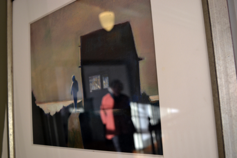 Marlene Loznicka is reflected in the glass covering her giclee piece "Manana." (Christine LaPado-Breglia photo)