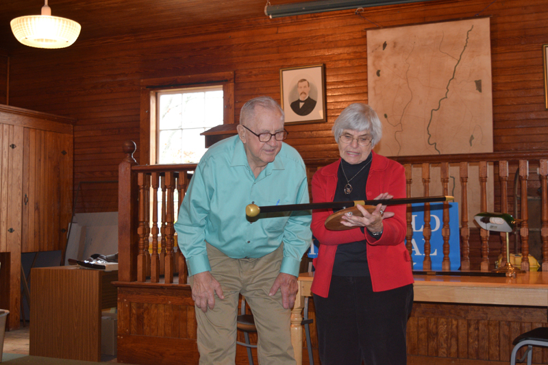 Albert Boynton and Marie Sacks, an archivist for the Whitefield Historical Society, look at a plaque recognizing Boynton as the town's oldest resident. (Jessica Clifford photo)