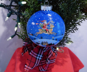 Ed Parker's "Happy Holidays" is a four-inch acrylic, double-sided ornament.