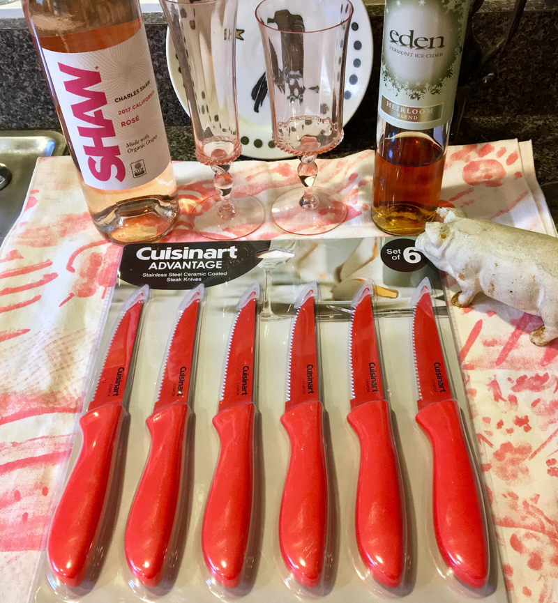 I'm very excited about my new red-orange steak knives, and SHAW wine - a buck more than Two Buck Chuck, but totally worth it :-) (Suzi Thayer photo)