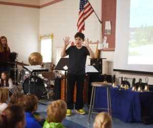 Bristol Consolidated School sixth-grader Logan Arzate speaks about solar energy at the school Thursday, Nov. 29. (Jessica Picard)