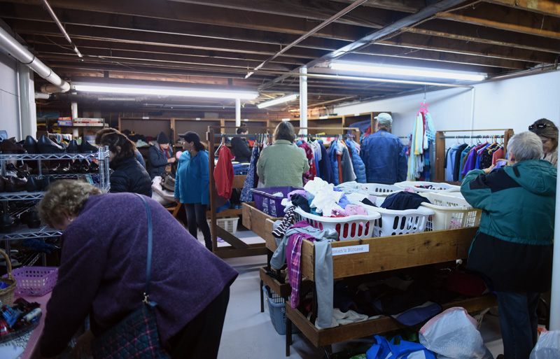 Shoppers at People to People, in the basement of the Damariscotta Baptist Church, Monday, Dec. 3. (Jessica Picard photo)