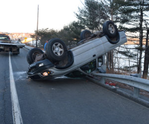 A 2004 Toyota Tacoma at rest on a guardrail on Route 1 in Edgecomb the morning of Monday, Dec. 10. The driver was not hurt, according to authorities. (Jessica Clifford photo)