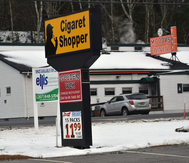 The sign for the new location of Golden Wok in Waldoboro. The Chinese restaurant is across Route 1 from Moody's Diner and in the same building as Cigaret Shopper. (Alexander Violo photo)