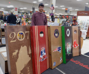 Sumner Averill, of Laid Back Lumber, has been making cornhole games for three years in Wiscasset. He sells them at the family business, Ames Supply in Wiscasset. (Paula Roberts photo)