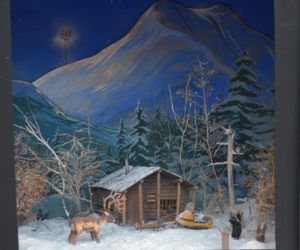 A cabin in the woods scene is one of Jake Day's dioramas on display at Milling Around in Newcastle through Jan. 5.