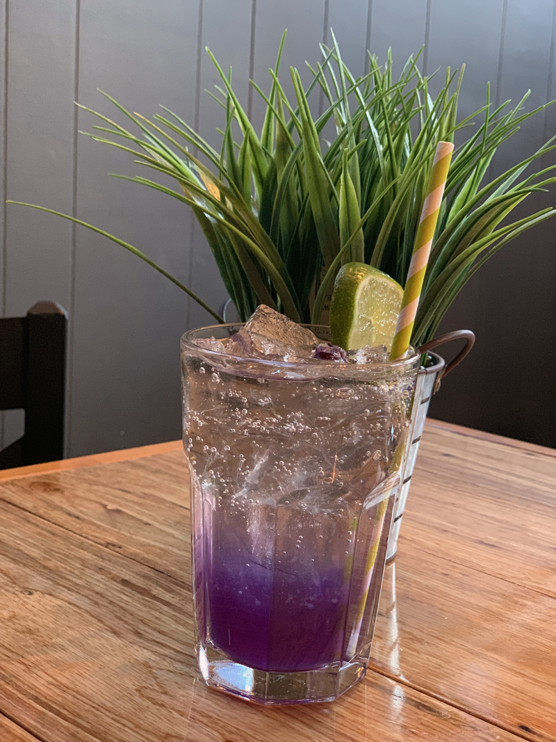 Butterfly pea flower tea, on ice, by Em Limvathanalert. (Suzi Thayer photo)