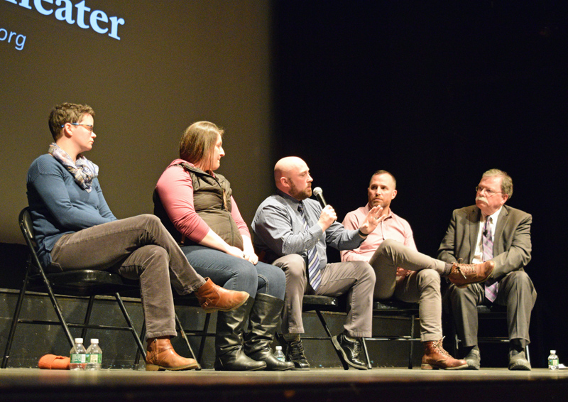 Damariscotta Police Chief Jason Warlick (center) speaks during a community discussion about the opioid crisis at the Lincoln Theater in Damariscotta on Tuesday, Jan. 29. From left: panelists Dr. Catherine Cavanaugh, Amanda Welch, Warlick, Dr. Tim Fox, and Don Carrigan. (Jessica Clifford photo)