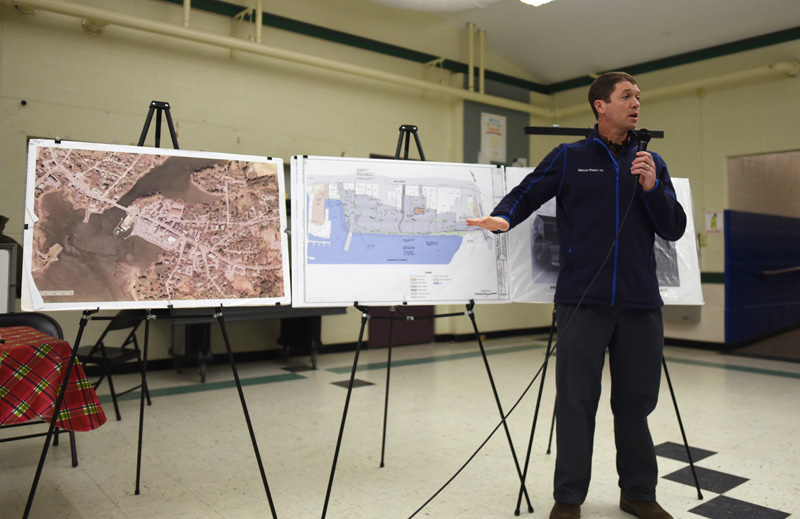 Travis Pryor, of the engineering firm Wright-Pierce, presents plans for changes to Damariscotta's municipal parking lot during a community conversation at Great Salt Bay Community School on Thursday, Jan. 17. (Jessica Picard photo)