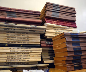 Stacks of bound archives of The Lincoln County News and some of its predecessors. (Maia Zewert photo)