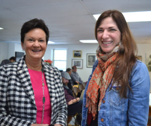 Julie Richard (left), executive director of the Maine Arts Commission, chats with Emily Peckham, director of development at Points North Institute in Rockland, at the 2019 Maine Arts Iditarod on Wednesday, Jan. 16 at River Arts in Damariscotta. (Christine LaPado-Breglia photo)