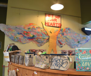 A group artwork effort by Great Salt Bay Community School students titled "Lift Up Your Hearts" on the wall of the cafe of Rising Tide Co-op in Damariscotta on Friday, Jan. 4. (Christine LaPado-Breglia photo)