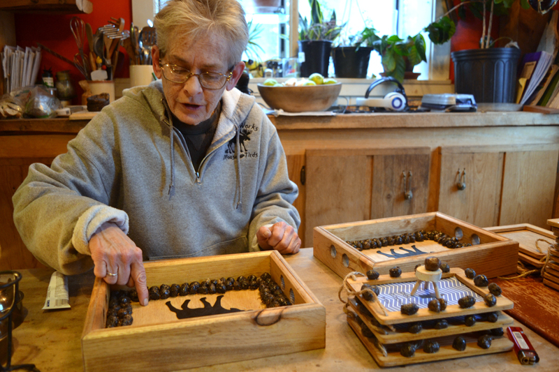 Mary Winchenbach finishes making a Poo Poo Platter, one of numerous in-demand items available from her business, Tirdy Works. (Christine LaPado-Breglia photo)