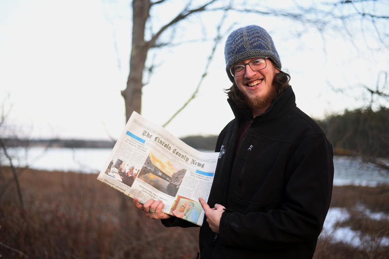 Dennis Boyd holds a copy of the March 29 edition of The Lincoln County News with his photo on the front page. The photo won the March contest before going on to take the annual contest too. (Jessica Picard photo)