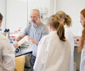 Senior research scientist David Fields instructs a group of high school students during the week-ong Keller BLOOM program. Fields was recently awarded the prestigious 2019 Ramon Margalef Award for excellence in teaching and mentoring for his leadership of Bigelow Laboratory for Ocean Sciences' education programs. (Photo courtesy Kevin Fahrman/Foreside Photography)