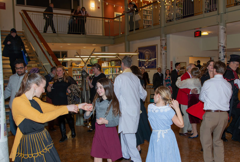Attendees of all ages flood the dance floor at the Through the Pages costume ball at Skidompha Library on Friday, Feb. 22. (Photo courtesy Dennis Boyd, dennisboydphotography.com)