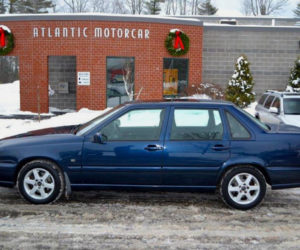 Atlantic Motorcar Center, of Wiscasset, gave this Volvo S70 to the Jones family, of Alna, in 2015. After using the car to transport their 14-year-old son to cancer treatment, the family regifted the car to another family with cancer treatment-related transportation needs. (Photo courtesy Atlantic Motorcar Center)