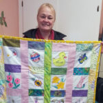 Daughters of American Revolution Make Quilts for Indian Island Kids