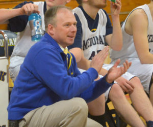 Medomak Unified coach Paul Smeltzer cheers on his team at home on Feb. 12. (Paula Roberts photo)