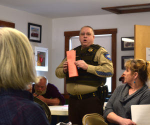 Lincoln County Sheriff Todd Brackett talks to Alna voters about the purpose of a false alarm ordinance during annual town meeting at the fire station Saturday, March 23. Voters approved the ordinance. (Jessica Clifford photo)
