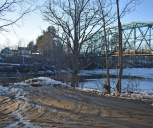 Dresden voters will decide whether to accept a gift from the estate of Inge Foster, a former selectman, to restore the Eastern River town landing under the Route 197 bridge. Foster lived in the house across the river. (Alexander Violo photo)