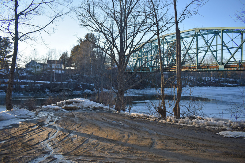 Dresden voters will decide whether to accept a gift from the estate of Inge Foster, a former selectman, to restore the Eastern River town landing under the Route 197 bridge. Foster lived in the house across the river. (Alexander Violo photo)