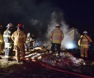 Area firefighters on scene of a barn fire in Jefferson on the night of Sunday, March 17. Farm animals died as a result of the blaze. (Jessica Clifford photo)