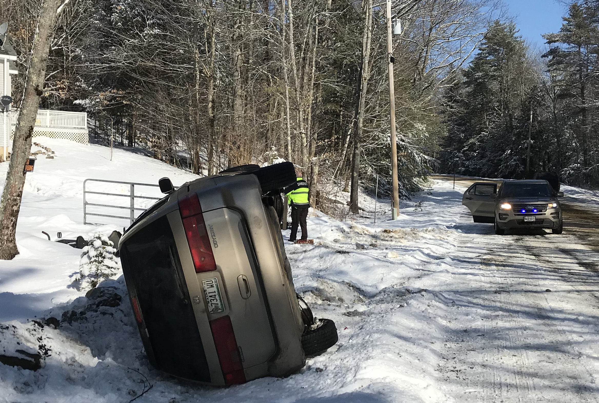 A 2001 Honda Odyssey rests on its side after a single-vehicle accident on East Pond Road in Nobleboro the morning of Sunday, March 3. There were no injuries, according to the Lincoln County Sheriff's Office.