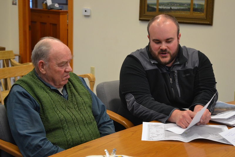 Maine Department of Transportation Project Manager Jason Stetson (right) speaks with South Bristol Harbor Master Cecil Burnham during the South Bristol Board of Selectmen's meeting Thursday, March 14. (Maia Zewert photo)