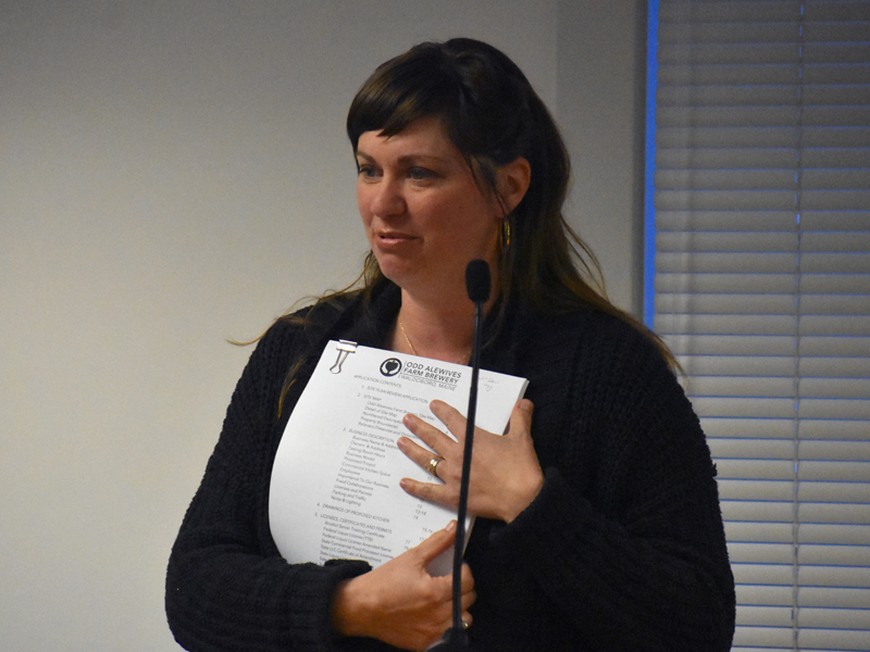 Sarah McNeil, of Odd Alewives Farm Brewery, presents the brewery's plans to add a small commercial kitchen with a pizza oven to the Waldoboro Planning Board. (Alexander Violo photo)