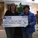 First National Bank Donates to Local Food Pantries