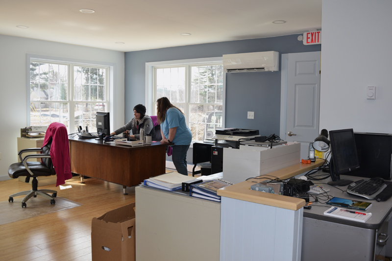 Alna First Selectman Melissa Spinney and Town Clerk Liz Brown work in the new town office. (Jessica Clifford photo)