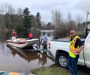 Jefferson Fire and Rescue personnel respond to an incident on Damariscotta Lake the morning of Monday, April 22. A fishing boat capsized and a nearby fisherman rescued the male occupant. (Photo courtesy Jefferson Fire and Rescue)