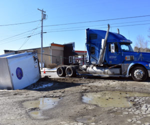 There were no injuries when the trailer of a tractor-trailer detached and rolled onto its side on Winslows Mills Road in Waldoboro, near Route 1, the morning of Thursday, April 11. (Alexander Violo photo)