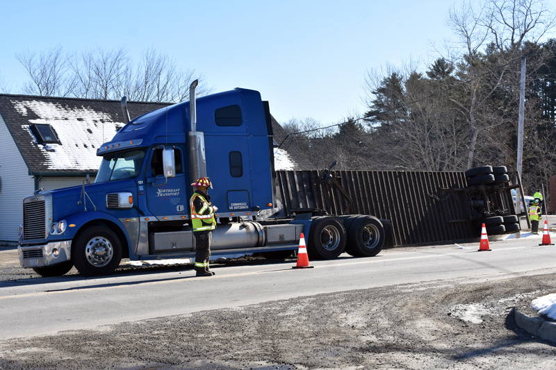 Waldoboro firefighters work at the scene of a tractor-trailer accident on Route 32 the morning of Thursday, April 11. (Alexander Violo photo)